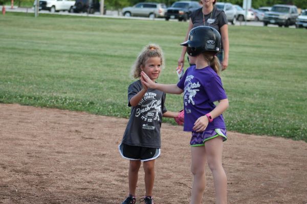 Little Girls High 5 at Tee Ball