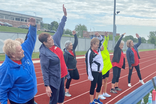 seniors stretching for a hike